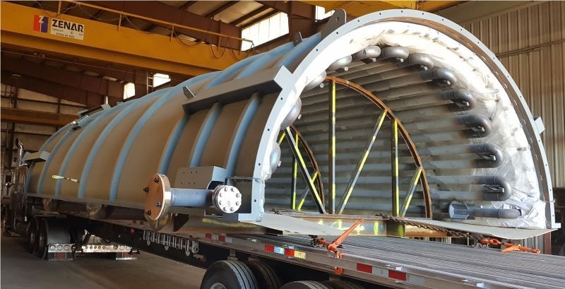 Large industrial vessel on flatbed trailer